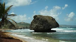 Large coral rock formations in the ocean at Bathsheba Beach on the east coast of Barbados.